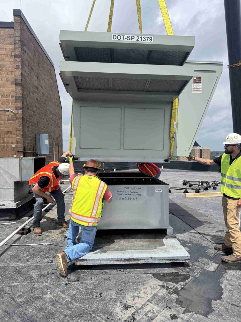 Franklin crew installing a commercial rooftop HVAC system