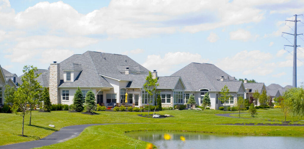 Homes beside a neighborhood pond in Powell, Ohio